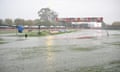 Water covers the running track as rain delays races during the 142nd running of the Stawell Gift
