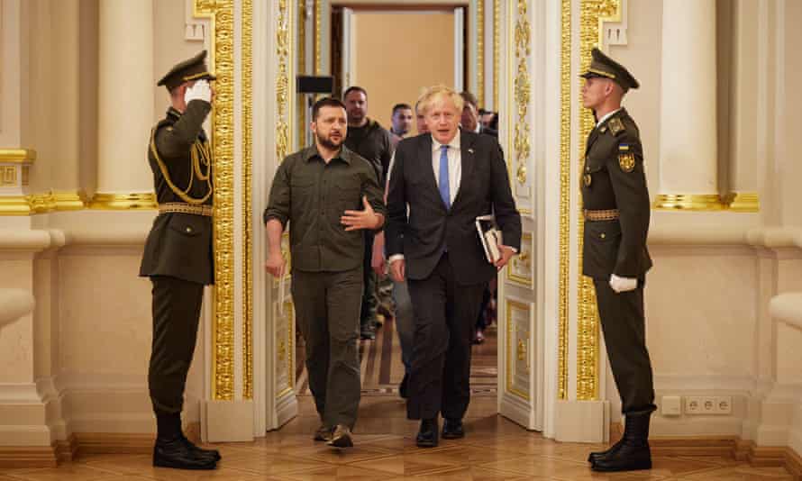 Russia-Ukraine war: Boris Johnson promises to give Ukraine ‘strategic endurance’ to prevail; Putin calls sanctions ‘reckless’ – live 5 Boris Johnson and Ukrainian President Volodymyr Zelenskiy, in Kyiv.