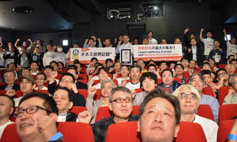 People named Hirokazu Tanaka gather in a Tokyo cinema for their successful attempt on the Guinness World Record for the largest gathering of namesakes.