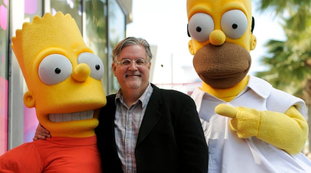 Matt Groening with Bart and Homer Simpson