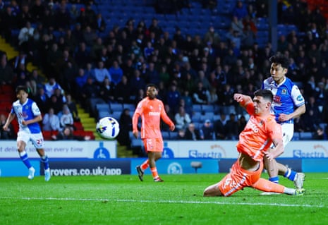 Ryoya Morishita of Blackburn Rovers scores the opening goal against Coventry City.
