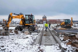 Builders at work outside the former Auschwitz-Birkenau concentration camp in Poland