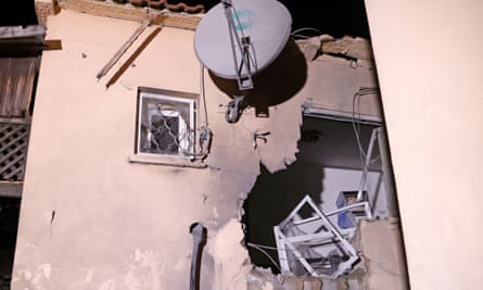 A house in the Israeli city of Sderot that was damaged by a rocket fired from Gaza by Hamas, 19 May.