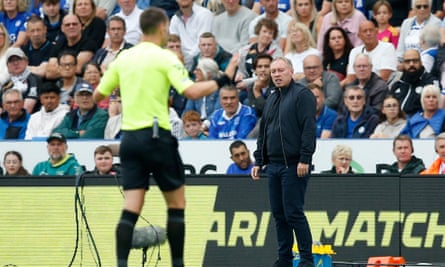 The Leicester manager, Steve Cooper, looks angry on the touchline.