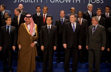 Gordon Brown standing with other world leaders, including Nicolas Sarkozy and Barack Obama
