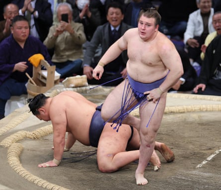 Aonishiki defeats Hoshoryu during the Grand Sumo Tournament in Fukuoka in November 2025.