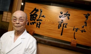 Jiro Ono pictured in front of his restaurant in 2007. Now in his 90s, he still makes its famed sushi with the help of his eldest son.