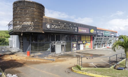 A shopping centre which was burned and looted by protesters in Nouméa on Thursday.