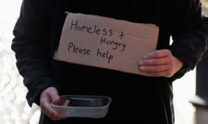 A homeless person begging on the street Coventry UK