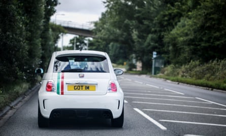 A white Fiat Abart car