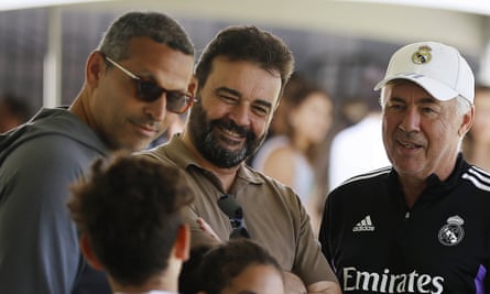 José Ángel Sánchez (centre) with Real Madrid's coach, Carlo Ancelotti