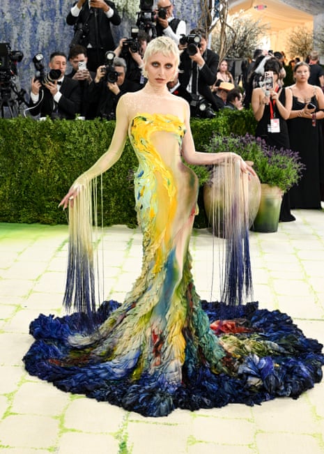 woman in colorful dress poses