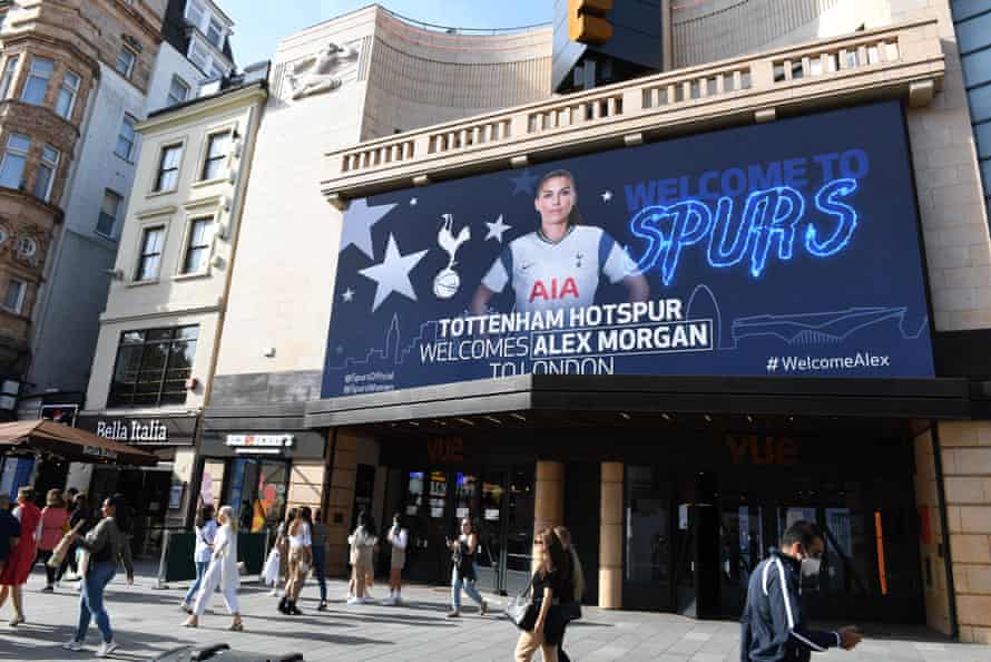 Tottenham announce the signing of Alex Morgan on a large screen in London’s Leicester Square.