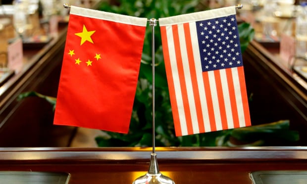 flags of the US and China are placed ahead of a meeting at the Ministry of Agriculture in Beijing