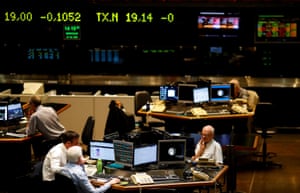 Traders on the floor of the Buenos Aires Stock Exchange, last night