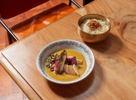 Bangkok Diners Club’s artichoke and aureate beetroot massaman curry pinch ‘decadently bully chicken-fat rice’.