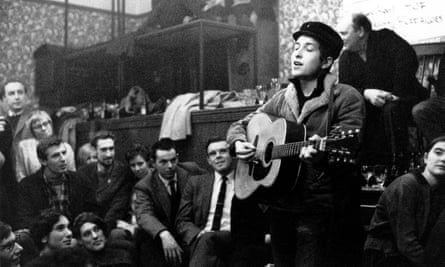 Dylan performs at the Singers Club in 1962.