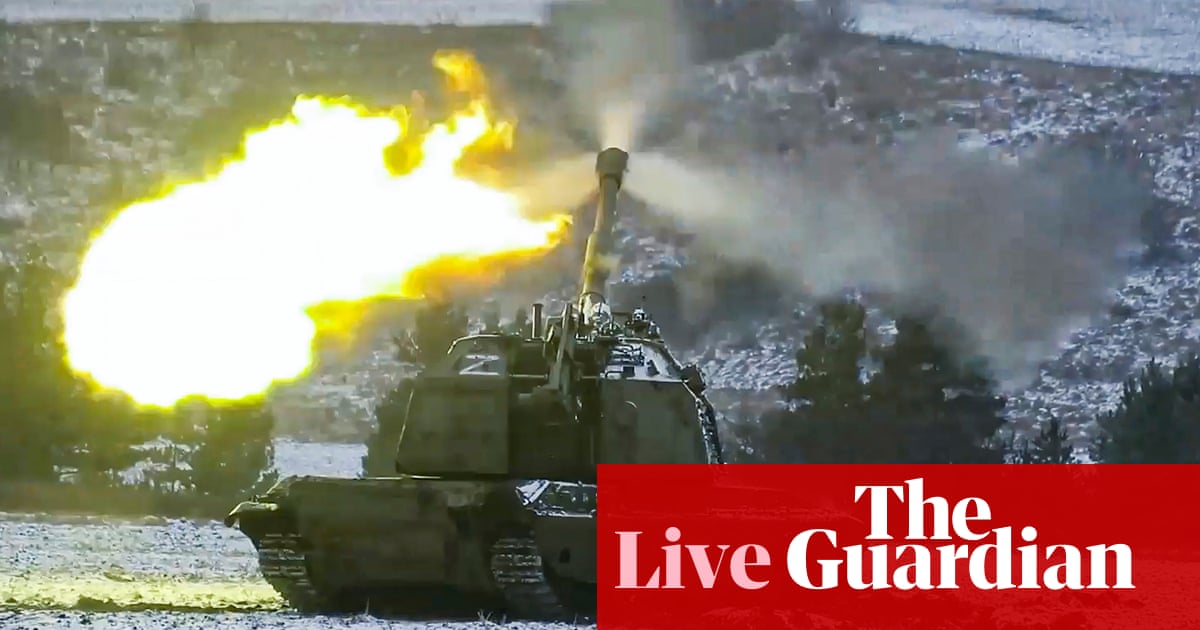 Russia-Ukraine war live: explosions and air raid sirens in Kyiv as Russians attack