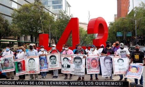 Relatives of the 43 missing student from Iguala, in the state of Guerrero, during a march at Reforma Avenue, on 26 May 2021.