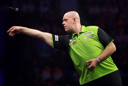 Michael van Gerwen throws against Chris Dobey in the Premier League in April 2025