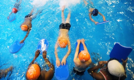 A mixed-sex school swimming lesson.