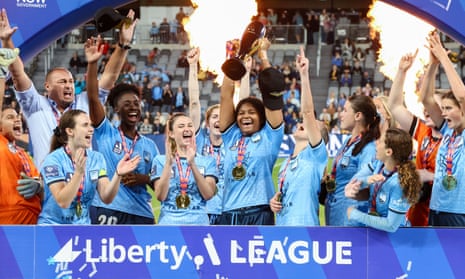 Sydney FC players celebrate after winning the A-League Women grand final against Western United at CommBank Stadium.