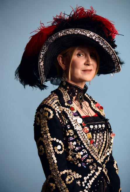 Linda Murphy posing for a photo in her pearly outfit