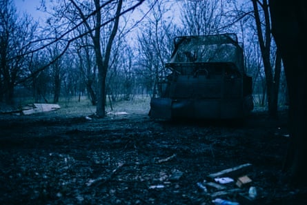 The carrier in a clearing among trees