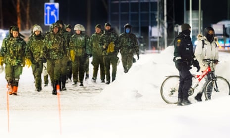 A person arrives with a bicycle to the Vartius border station in Kuhmo, eastern Finland, on 19 November.