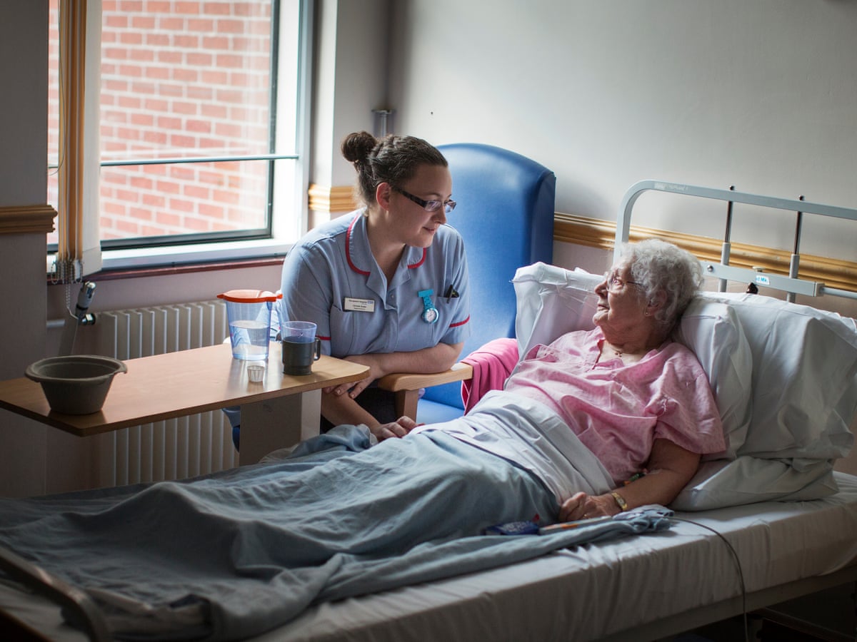 Young Man Lying On Bed At Hospital - stock photo - Crushpixel