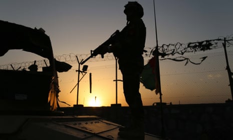 An Afghan Army soldier mans a check point in Jalalabad, Afghanistan.