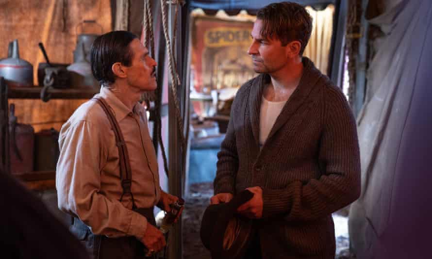 Factual Evil… Willem Dafoe, left, and Bradley Cooper in Nightmare Alley.