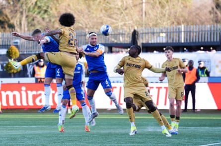Paul Dawson (with a bandaged head) scores the opening goal for Macclesfield against Crystal Palace.