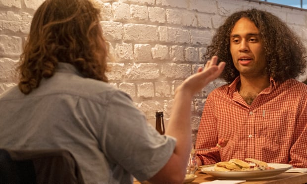 Dining across the divide: ‘He supports a new Heathrow runway – we should invest in trains’ 4 Jasper and Miles sitting at a restaurant table against a white-painted brick wall