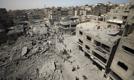 Buildings are destroyed and surrounding buildings and vehicles were heavily damaged at al-Daraj neighbourhood after Israeli attack, in Gaza City, Gaza.