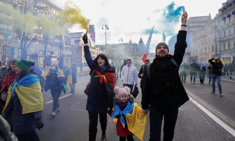 Ukrainians filed through the centre of Kyiv in a column, chanting ‘Glory to Ukraine’.