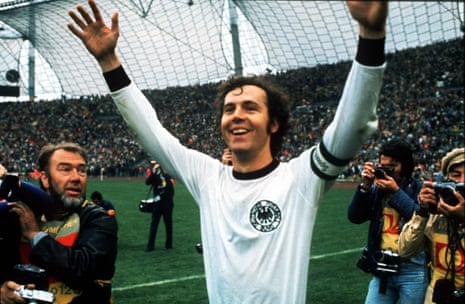 Franz Beckenbauer celebrates victory in 1974