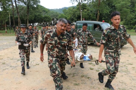 Nepali soldiers after a helicopter rescue of survivors of the flash flood