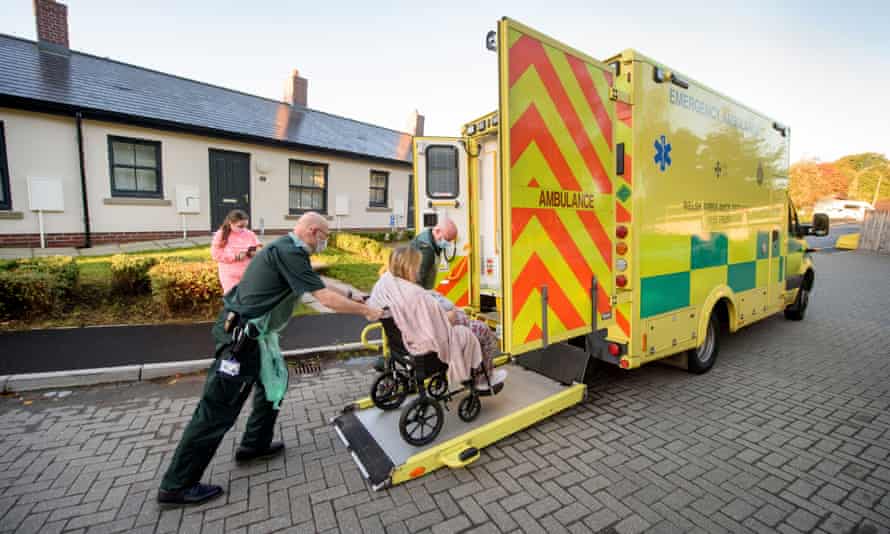 Keith Rogers, an exigency aesculapian technician, wheels Caroline to the ambulance earlier taking her to the Grange assemblage infirmary adjacent Pontypool.