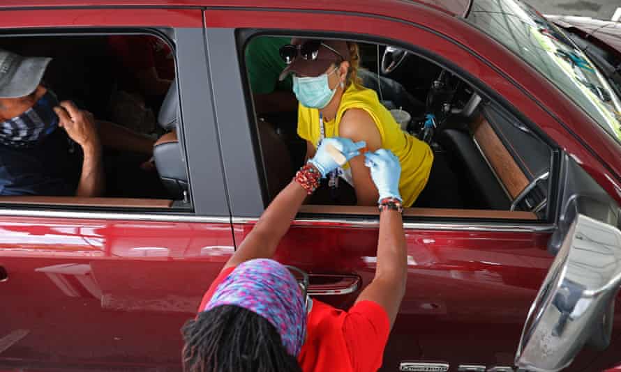 A woman receives a vaccine in Aberdeen, Maryland. The state reported that all of those who died of Covid there in June had not been vaccinated.