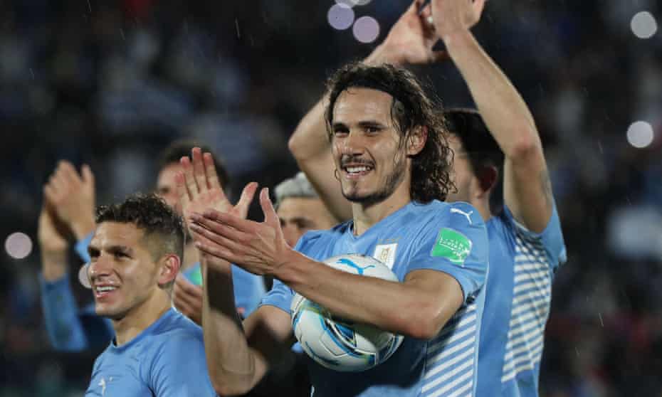 Edinson Cavani celebrates with his Uruguay teammates after World Cup qualification was sealed