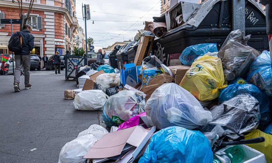 Rubbish bags at a waste and recycling collection point in central Rome last month
