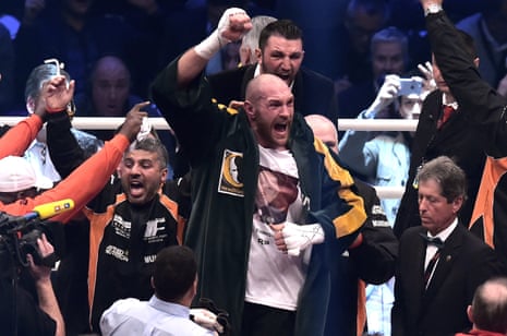 Tyson Fury celebrates after getting the decision.