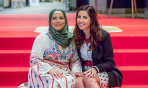 Kholoud Al-Faqih (left), the first female judge in the Middle East's religious courts, with Erika Cohn, director of the Judge