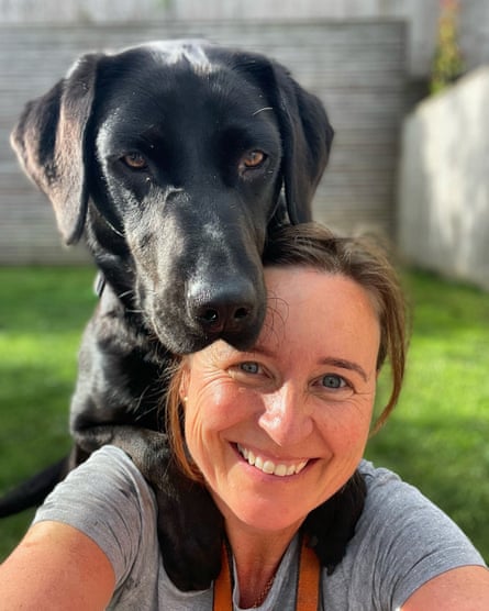 Smiling woman and happy dog