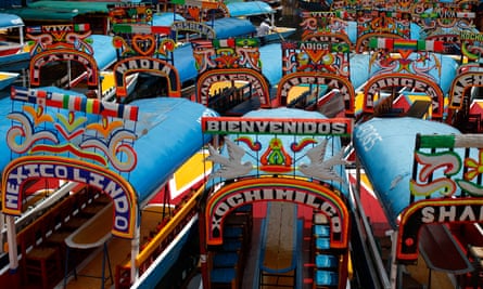 Trajinera boats parked in one of the canals of Xochimilco.