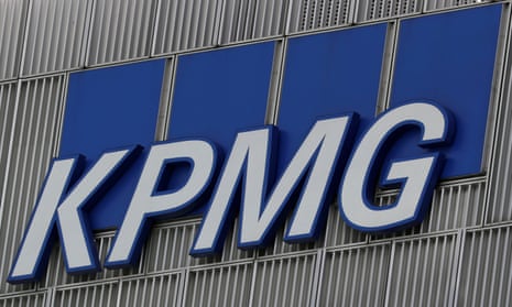 The KPMG logo on an office building in Canary Wharf, London