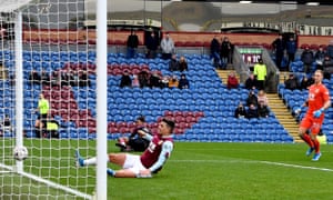 Peterborough United’s Ivan Toney (back) scores his side’s first goal of the game.