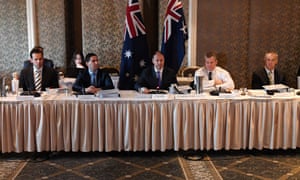 Energy minister Josh Frydenberg (centre) and his state counterparts met on Friday to discuss the Finkel report into future security of the national electricity market. 
