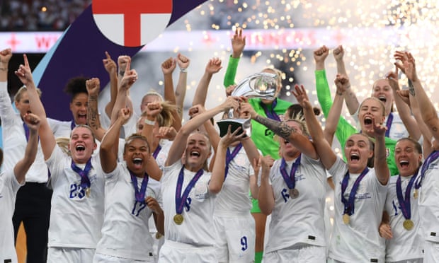 The England team lift the trophy after their 2-1 win over Germany in the final of the Women’s Euros.